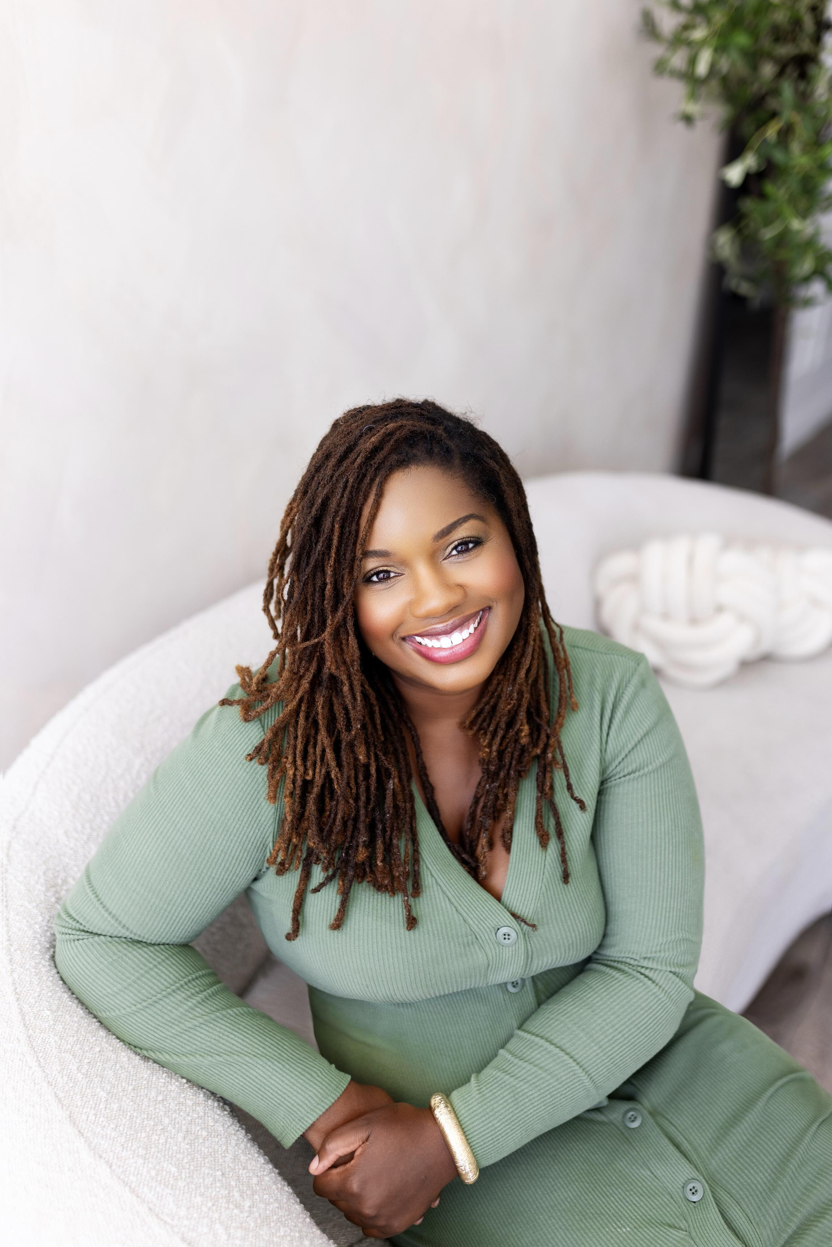 Lashonda Geffrard Lashonda Geffrard on a couch