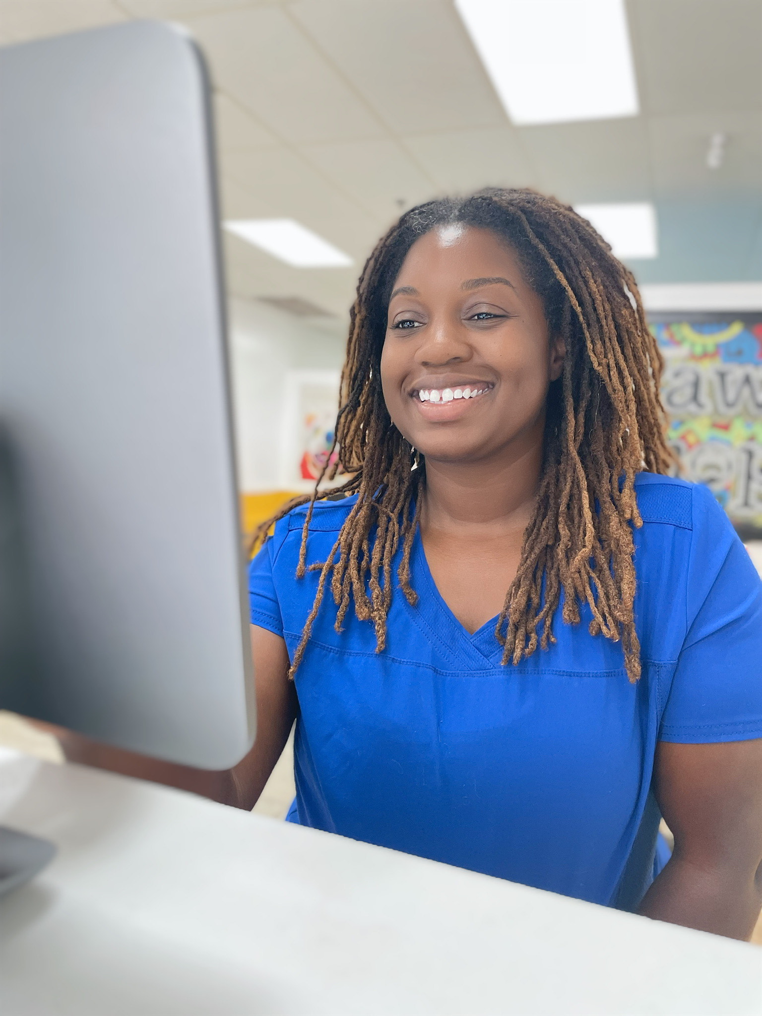 Lashonda Geffrard on a computer